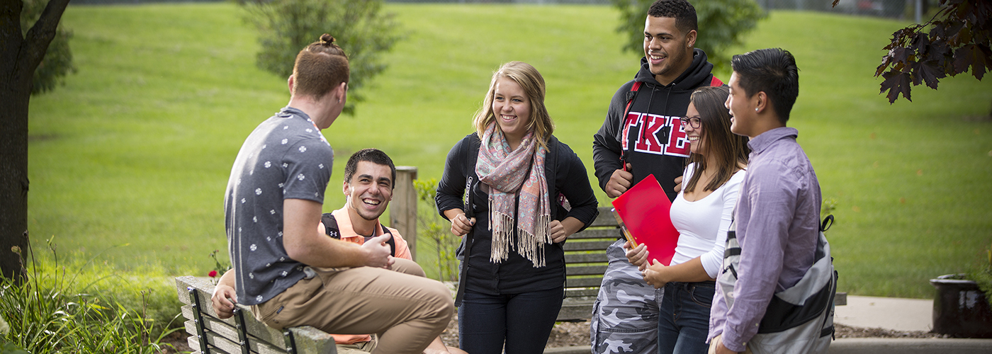 Students on campus bench